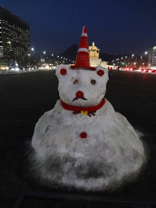 Yes, the hat is a traffic cone