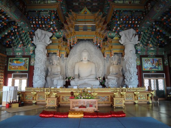 Each statue is carved out of one rock. They were made first and then the structure was built around them.