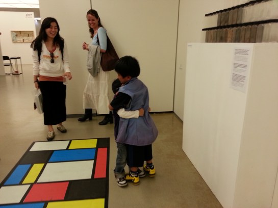 Hugging! With my friends Hyomin and Amy in the background.