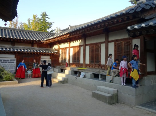 Hanboks on the left, superheroes on the right.