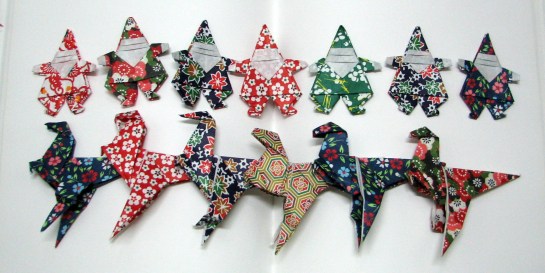 My fleet of Santas and velociraptors is complete.